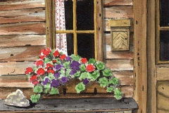 klaus_decker_fenster_m_blumen_u_holzstapel